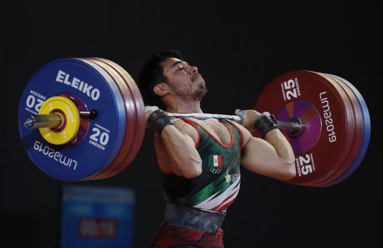 AP Photo, Jonathan Munoz,El mexicano Jonathan Munoz realiza un levantamiento durante las pesas de los Juegos Panamericanos de Lima, el sábado 27 de julio de 2019 (AP Foto/Fernando Vergara)