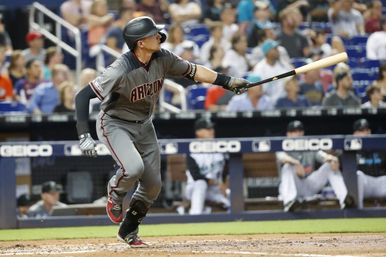 AP Photo, Nick Ahmed,Nick Ahmed de los Diamondbacks de Arizona tras conectar un grand slam ante los Marlins de Miami, el sábado 27 de julio de 2019. (AP Foto/Wilfredo Lee)