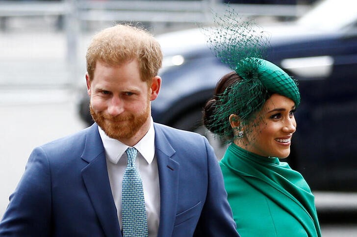LYNXNPEG8M15D.jpg,FOTO DE ARCHIVO. El príncipe Enrique de Gran Bretaña y su esposa Meghan, los duques de Sussex, en una ceremonia en Londres. Marzo, 2020. REUTERS/Henry Nicholls; Crédito: Henry Nicholls, Reuters