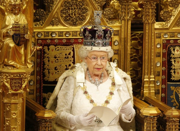 Britain's Queen Elizabeth II reads the Queen's Speech from the throne during the State Opening of Parliament in the House of Lords in London, Wednesday, May, 18, 2016. The State Opening of Parliament marks the formal start of the parliamentary year and the Queen's Speech sets out the government's agenda for the coming session.(AP Photo/Alastair Grant Pool)